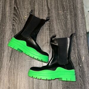 green and black leather boots